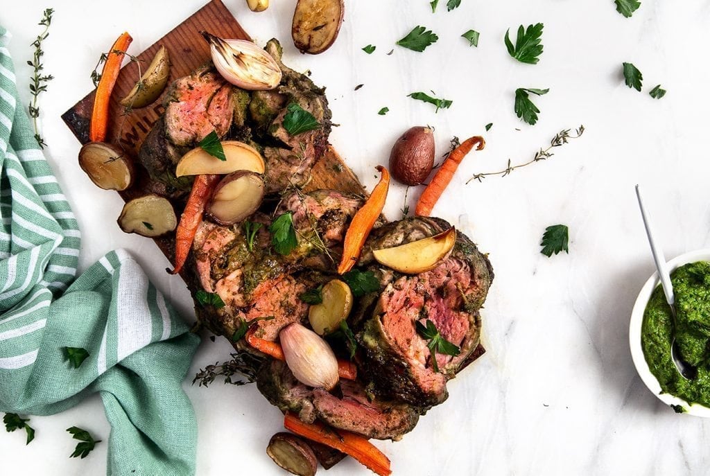 Cedar Planked Herb-Stuffed Lamb with Carrots, Potatoes and Onions