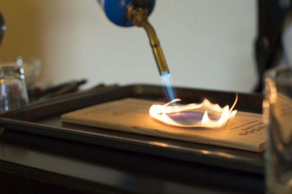 Using a Torch to create Smoke from a Grilling Plank