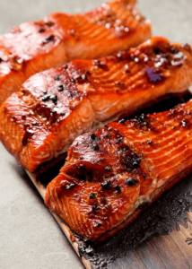 Teriyaki salmon served on a cedar plank
